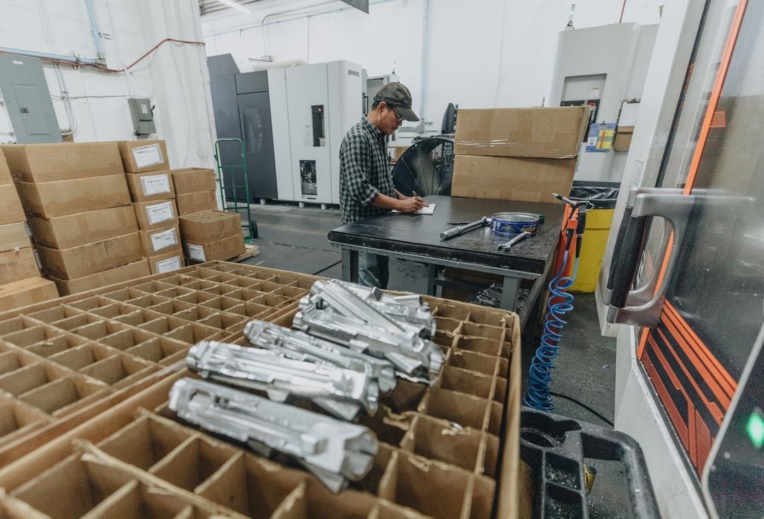 Aero Precision rifle upper receivers being worked on.