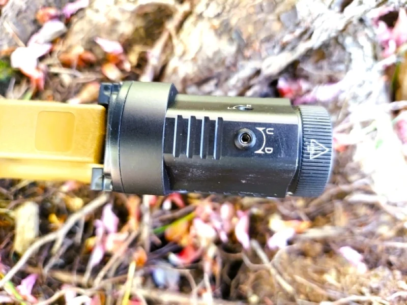 Adjustment to raise and lower the laser aim