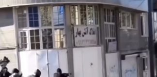 iranian citizens fire back on government forces during riots, they use weapons they've likely taken from the police