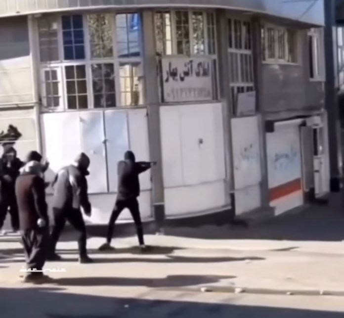 IMG_6711 iranian citizens fire back on government forces during riots, they use weapons they've likely taken from the police