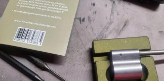 a starter punch and roll pin punch and forward controls gas block inside the jig