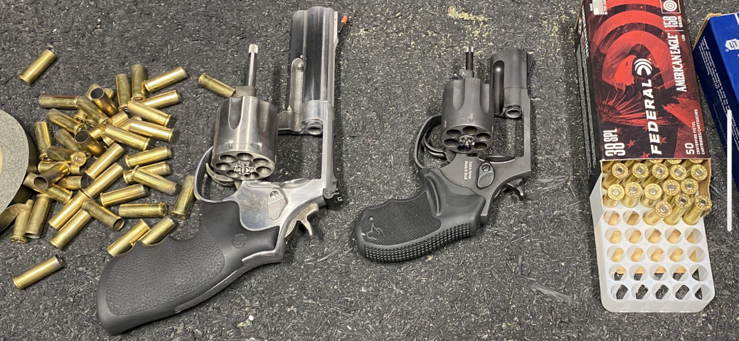 IMG_7189 .38 Special casings along with revolvers Smith and Wesson